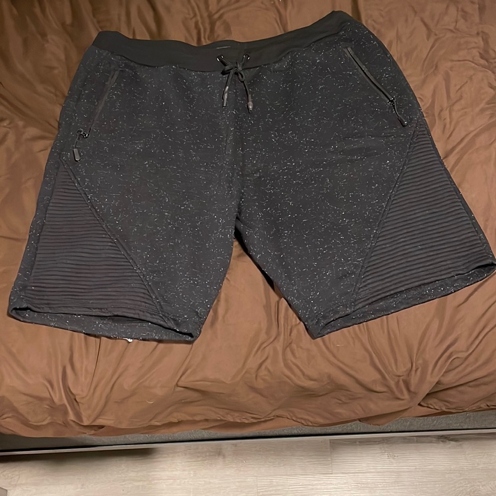 Black polyester athletic shorts